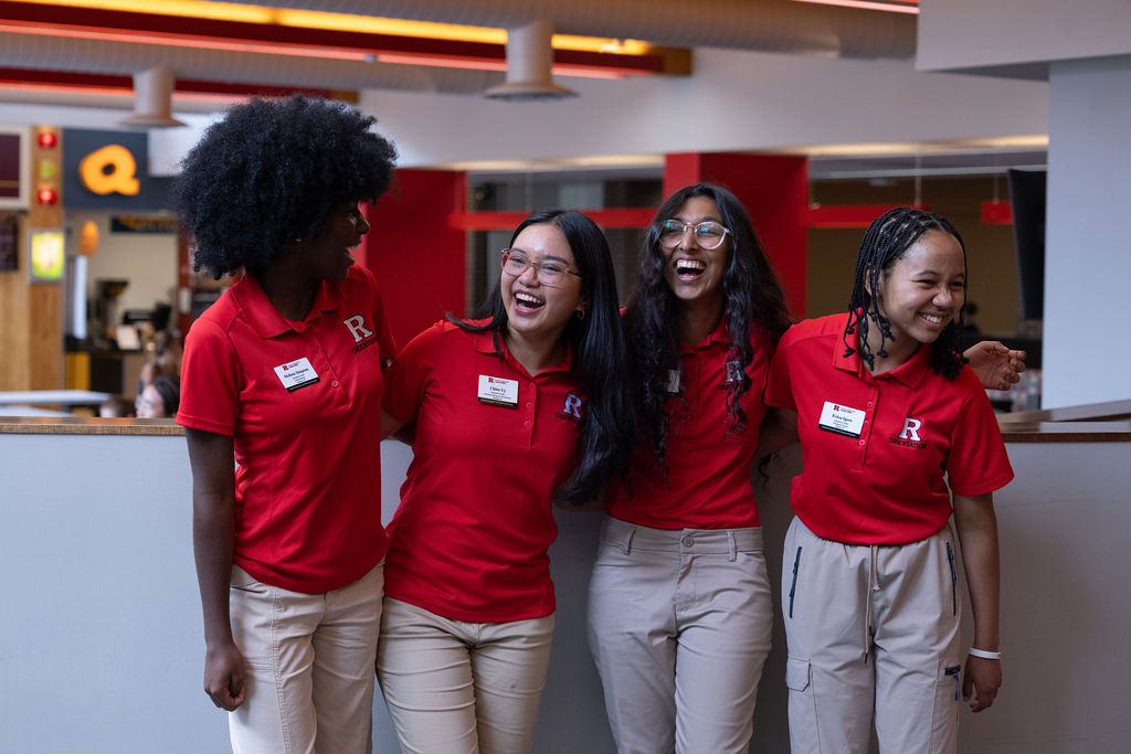 Four Orientation Leaders Smiling and Laughing